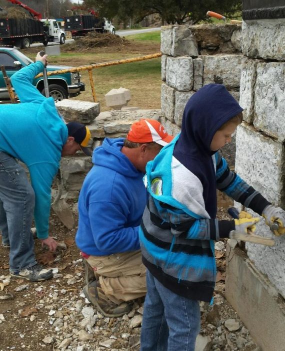 Three generations of Fair masons working together